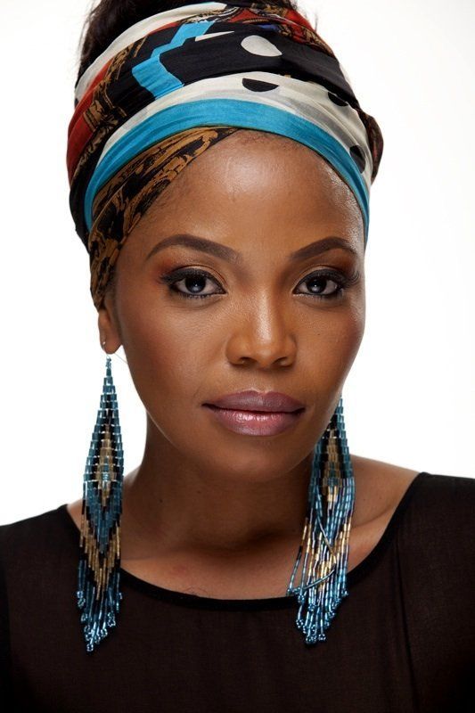 Gorgeous! Learn how to tie your own head scarf like this: http://curlsunderstood.com/how-to-tie-a-headwrap