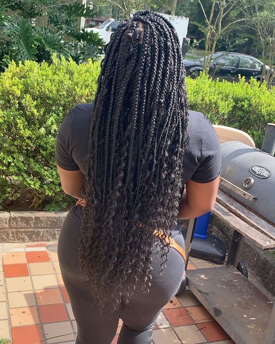 bohemian box braids with curly ends